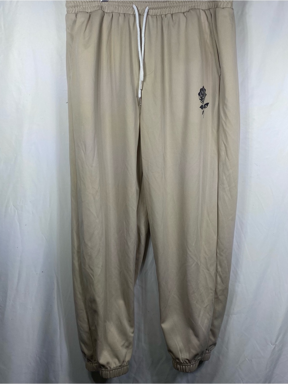SHEIN Beige Jogger Pants with Black Rose Graphic